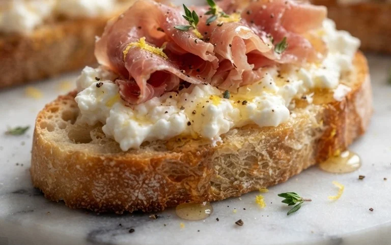 Beef Prosciutto Crostini with Burrata and Lemon Honey Drizzle